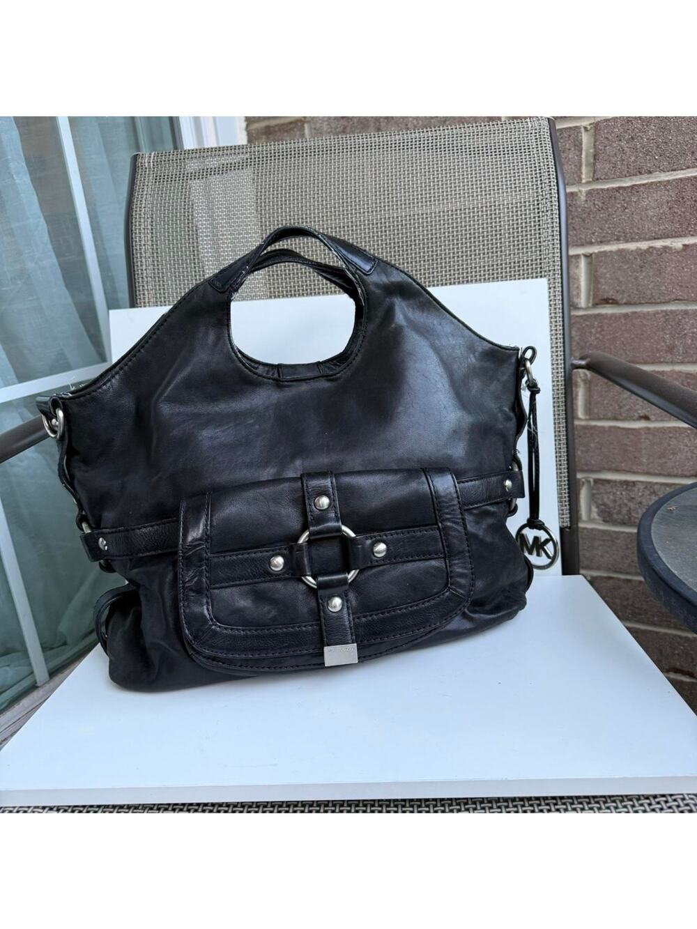 Vintage black michael kors shoulder tote bag with silver buckles